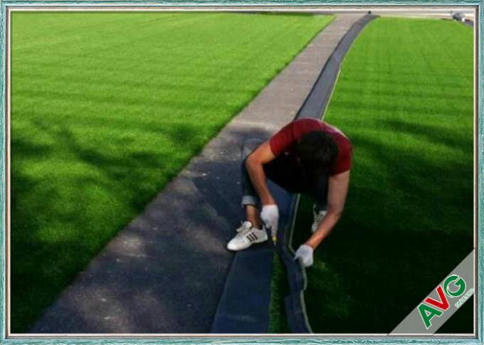 12-letnia sztuczna trawa odporna na promieniowanie UV 12000 Dtex z otworami drenażowymi 0
